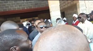 Incarcerated former PF MP Nixon Chilangwa attends the funeral of his wife, Mwamba Kambimbi Chilangwa, at UCZ Chilanga Congregation. 📸 Bernard Kamba | Kukamba