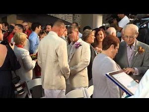 Gay and straight couples wed, reaffirm vows during mass ceremony