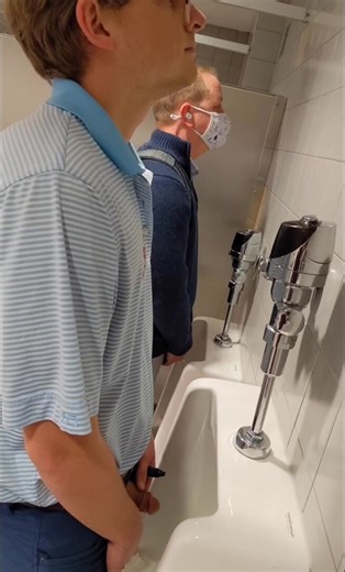 Cute Nerdy Guy at Urinal