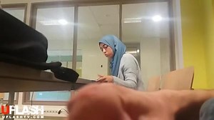 dickflash next to arab girl in library