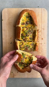 10K views · 58 reactions | Ready to up your breakfast game beyond the basic bacon, egg and cheese? 肋讀燎 Swap the bagel for a loaf of bread that’s hollowed out and stuffed with all your fave omelette fillings. 𣏕暈 RECIPE: https://www.justataste.com/video-cheesy-baked-egg-and-bacon-boats-recipe/ | Just a Taste | Facebook