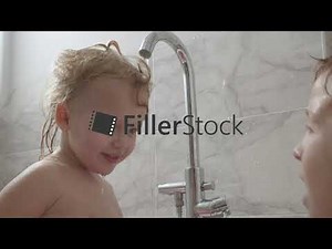 It is fun to play with elder brother in the bath