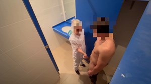 I surprise the cleaning lady at the gym giving me a handjob in the bathroom and she helps me finish cumming with a blowjob