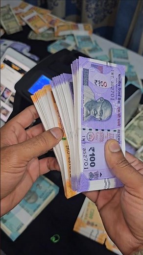 Counting 100&200-rupees Currency 💸