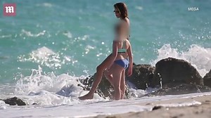 Kaia Gerber flaunts her model figure in skimpy bikini on beach
