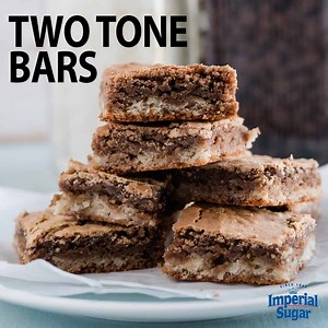 25 reactions · 12 shares | These Two Tone Bars combine layers of chocolate and coconut to satisfy your sweet tooth like no other! Recipe here: https://bit.ly/2xpHnwa | Imperial Sugar | Facebook