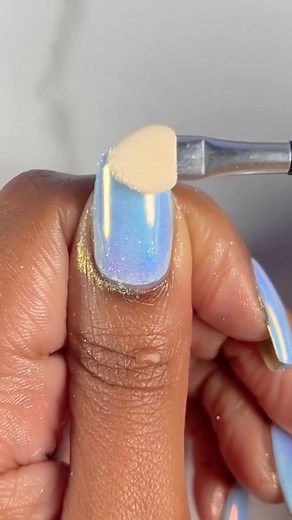@suziemoon626 showcases incredible chrome nails using Whats Up Nails - Aurora Pigment ($21.75 USD), available on our site WhatsUpBeauty.com (link in bio)! Effortlessly create stunning white chrome nails with this amazing nail product. Apply it over different colors to witness a plethora of effects! This magical unicorn powder offers endless possibilities for your manicures. Experience the magic firsthand - we ship worldwide from the USA! #whatsupnailsaurorapigment #nailart #naildesign #aurorapig