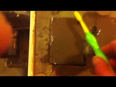 Cleaning tintype photos