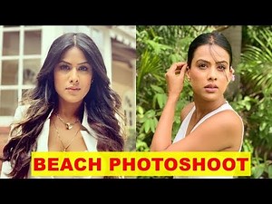 Nia Sharma looks stunning in white as she poses on the beach
