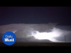Rare 'red sprite' bursts shoot out of supercell storm in TX - Daily Mail
