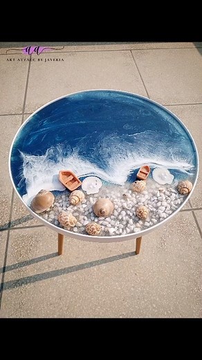 Beach Theme Coffee table created in Recent Class. Size 18 inches Available for immediate delivery. Dm for customization #beachtheme #beacheffect #resinartkingdom #resinfunart #resinbeach #resintutorial #resineffects #resinpour #resinart #resin #handcrafted #handmade #diy #epoxyart #homedecor #interiordecor #pakistan #lahore #karachi #islamabad | Art Attacc by Javeria