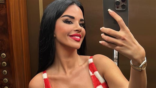 Ivana Knoll spills out of Berlin apartment as she puts on revealing display