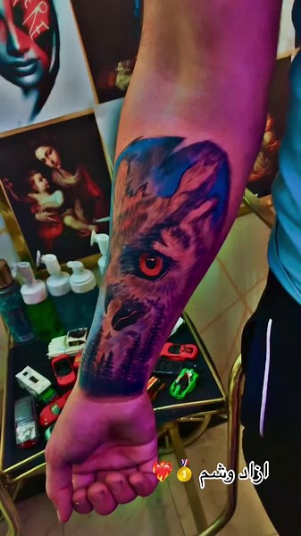 Realistic Owl Tattoo Showcase on Forearm