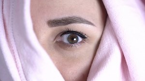 Woman Looks Out Under Blanket Female Stock Footage Video (100% Royalty-free) 1068073499 | Shutterstock