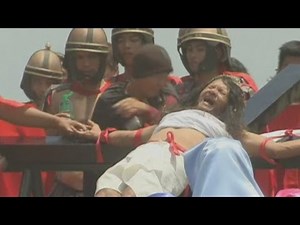 Good Friday crucifixion rituals: Philippine devotees nail hands and feet to wooden crosses
