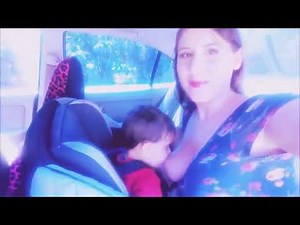 breastfeeding baby inside the car