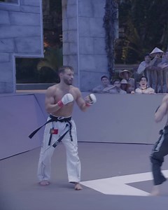 He ran him up the pit wall then slammed him?! | Karate Combat