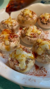 These cream cheese stuffed mushrooms are delicious, simple to make and packed with protein and nutrients!! Keto friendly and low carb is a bonus. 10 large button mushrooms with the stems pulled out•4 pieces hard salami chopped • 2 tsp Wisps Parmesan crumbs with Italian seasoning • 1/2 cup whipped cream cheese • 1 slice provolone cut into small strips • paprika • ancho chilli oil •salt and pepper to taste I prefer my mushrooms to maintain a firm texture so I only had them in toaster oven long eno