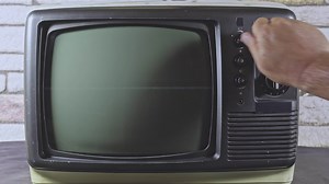 Old Technology Color Television Manual TV Channel Search and Noise Footage.