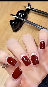 42K views · 237 reactions |  Wine red nails – classy at first glance Short square shape with a deep wine red tone and subtle glitter details ✨ Simple, elegant, and flattering on all skin tones. #reelsfacebook #nailsdesign #nailtrend #nailinspo #christmasnails | Stylish Nail Art Designs | Facebook