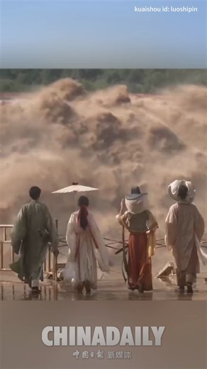 24K views · 349 reactions | Tourists wearing traditional Chinese clothing walked towards the camera with their backs facing the surging tide, which resembles the scene from martial arts movies. #TrendingNow | China Daily | Facebook