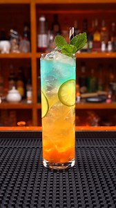 Iced fruit cocktail，best in hot summer Orange Red Bull Rum Ice Lemon soda Two slices of lemon Top with Pre-made cocktail drinks | Bartender Bournis