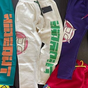 [Hot Item] Custom Logo Streetwear Puff Printing Unisex Sweatpants Men′ S Women′ S 100% Cotton Fleece Sports Jogger Stacked Pants for Men Women
