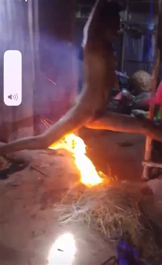 🚨🎥 Viral WhatsApp video: Naked girl tied with rope over burning fire below her after collecting money and not showing up. If real, this is extreme mob 'justice'. Location/source? Heavy nudity + violence warning ☠️⚠️