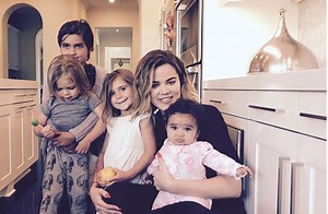 Kourtney Kardashian's Kids Play in Front of Khloé's Naked Pic