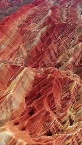 A Danxia landform is a red-bed landform characterized by steep cliffs. The landforms are unique types of petrographic geomorphology found in China. Isn’t it a gift from nature? 📷Douyin/hangpaixiaoer 📍Gansu Province, China #China #landform #travel #cliff nature | iChongqing