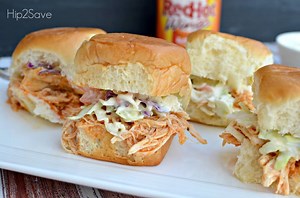 Slow Cooker Shredded Buffalo Chicken Sliders Ingredients 4 -5 skinless, boneless chicken breast halves 1 (12 ounce) bottle buffalo wing sauce, divided 1/2 (1 ounce) package dry ranch salad dressing mix 2 tablespoons butter 2 packs of soft rolls like Kings Hawaiian brand rolls SEE FULL RECIPE: http://hip2save.com/2014/01/21/slow-cooker-shredded-buffalo-chicken-sliders/ | Hip2Save