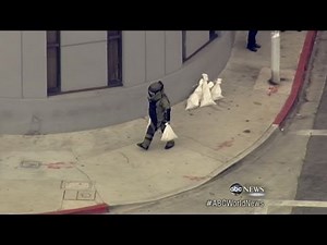 Robbers Strap 'Bomb' to Bank Manager