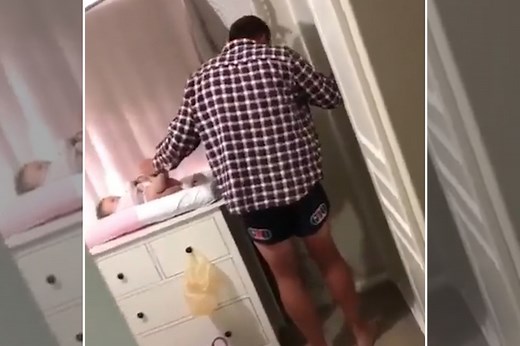 Hung-over dad gags while changing baby’s diaper