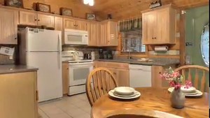 👀 Check out recently renewed cabin in the woods, 2-bedroom, 2-bath "Mountain Splendor." 👨‍👩‍👧‍👦 Hidden Mountain West Cabin #8016 sleeps 8 guests with two main level bedrooms with Queen beds, a bonus room in the open loft with a twin size trundle bed, and a sleeper sofa. At only $125/night, "Mountain Splendor" is a fantastic deal for families visiting the Smoky Mountains! 🔥 And perfect for cold winter nights in the mountains, this secluded cabin also offers a wood-burning fireplace to enjoy