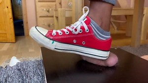 Ball crush with red Converse Chucks