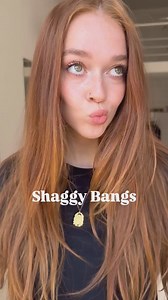 Long shaggy bangs on long hair: 🔥🔥🔥 Perfect for girls with ✨effortless vibes✨. See how beautifully they frame the face & hide a multitude of sins (like those pesky forehead wrinkles). ☝️ Style with texture spray & air dry for that "I woke up like this" look. 😉 Video by @belinda_lee_mills #bangs #hairstyles #2025hairstyletrends #easyhairstyling #hairtutorial #hairquiz #pickyourhair #trendyhaircuts2025 #lovehairstyles #wolfcut #shagcut #fringe #copperhair | Love Hairstyles