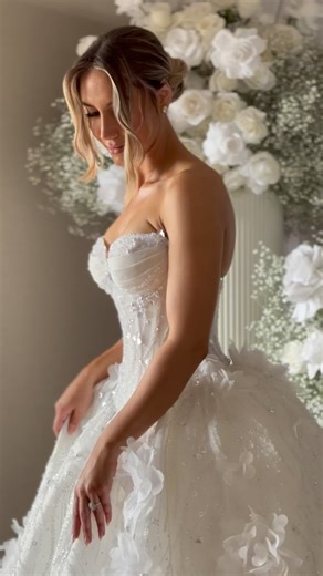 Rebecca the morning of adorned in her Norma & Lili gown. | Norma and Lili