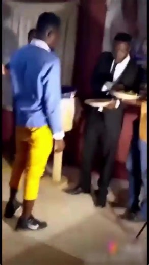 Viral clip shows a pastor eating garri with soup, then making church members lick his fingers. | Baron Large | Facebook
