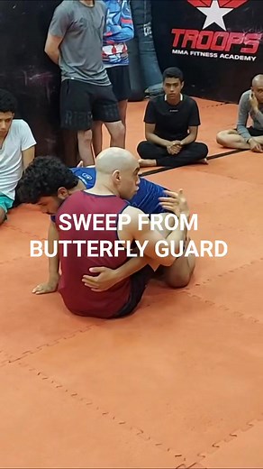 Sweep from the Butterfly Guard! #mma #mmafighter #mmatraining #grappling #jiujitsu | TROOPS MMA