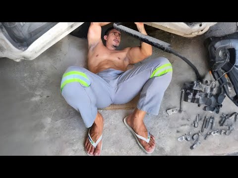 Muscular Mechanic Shirtless Working