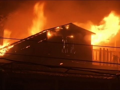 Raw: Forest Fire Burns Home on Madeira Islands