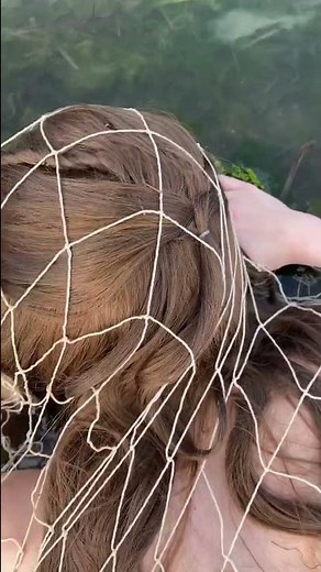 Saving a beached mermaid from a fishing net 😰 #mermaidvideos