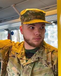 A soldier assisted a drowsy woman in the bus | Handy Panda