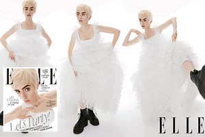 Lily Collins shows off quirky style in frilly white dress & black platform boots