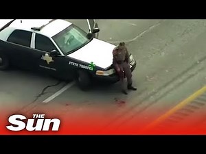 Police officer SHOT during gunfight with suspect