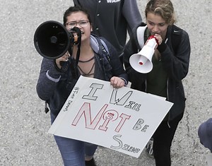 Austin High School students protest arrest of immigrant student booked into jail for assault