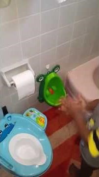 My Lil grown man and his urinal