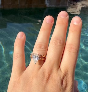 12K views · 25 reactions | That engagement ring shimmer. That style. That story.  Bobbi Jo and Austin customized her Woodland Wedding Set — featuring delicate leaf details, diamond accents, and a nature-inspired design that’s all about organic beauty. It’s a ring as unique as their love, crafted to last forever. Ready to design your dream ring? Start here: https://bit.ly/3IO31CM  @bobbiholyfield on Instagram | Shane Co. | Facebook