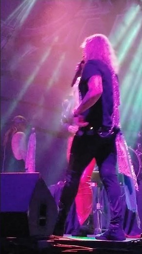 Steel Panther hottie on stage flashing