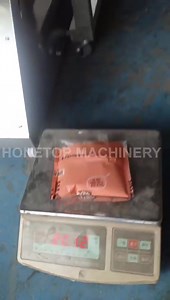 Small packing machine with auger weigher (suits to pack town brown powder) | Honetop Packing Machine